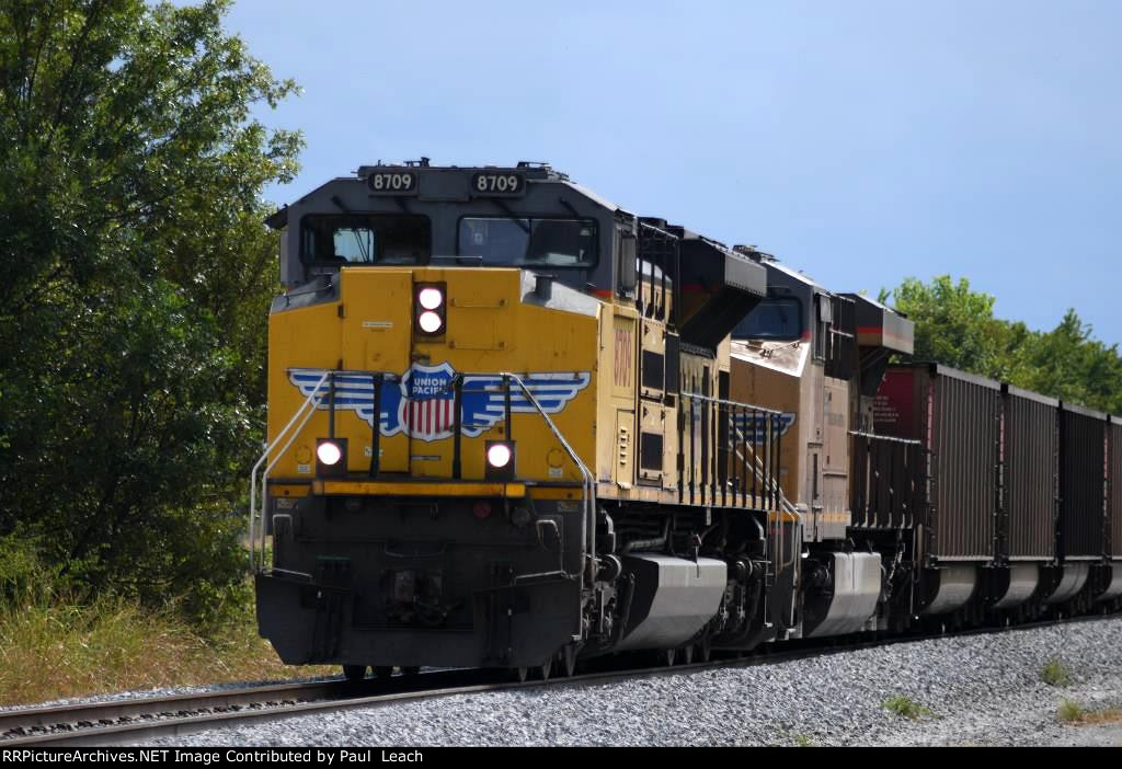 Empty coal train waits to proceed